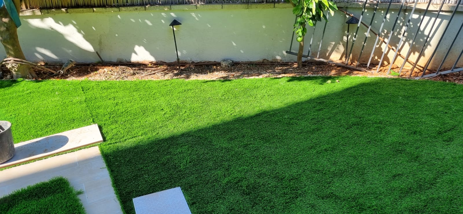 התקנת דשא סינטטי